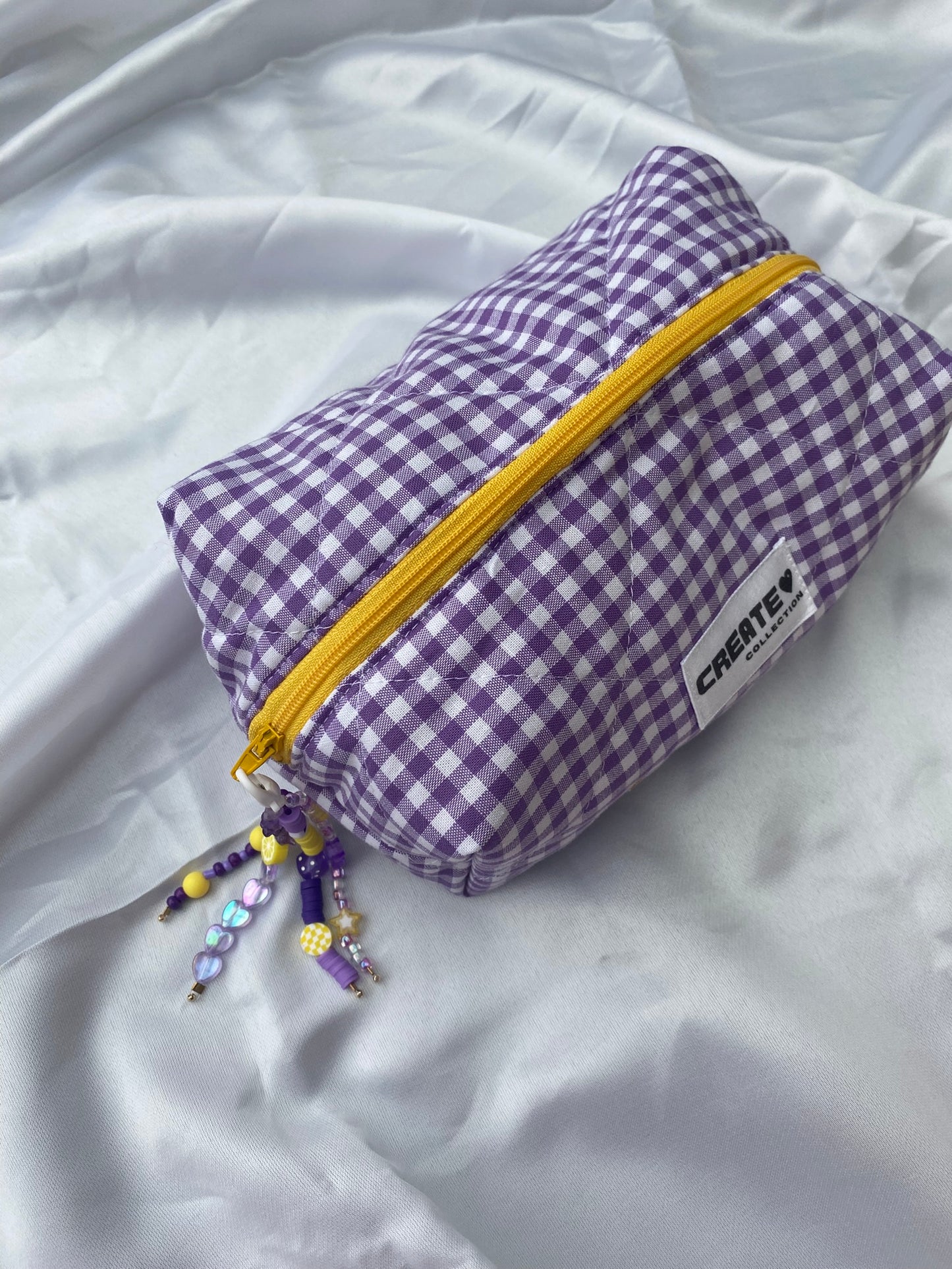 Porte-clés violet et jaune