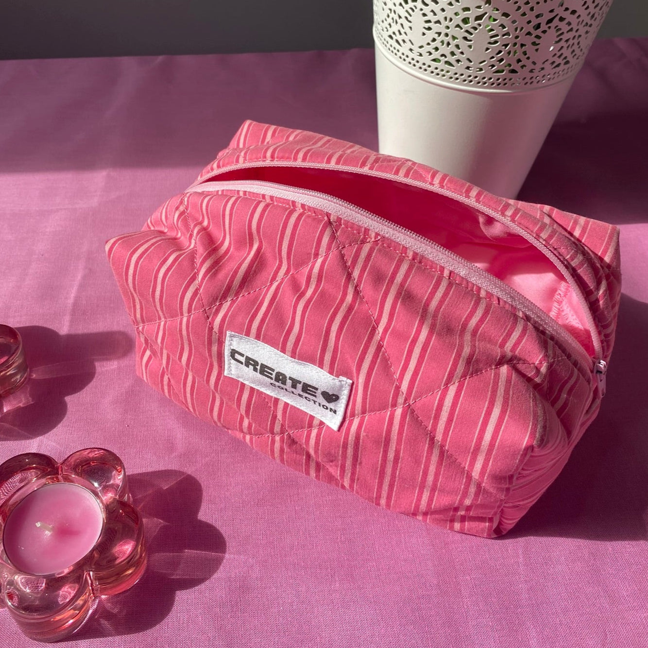 Trousse rose à rayures