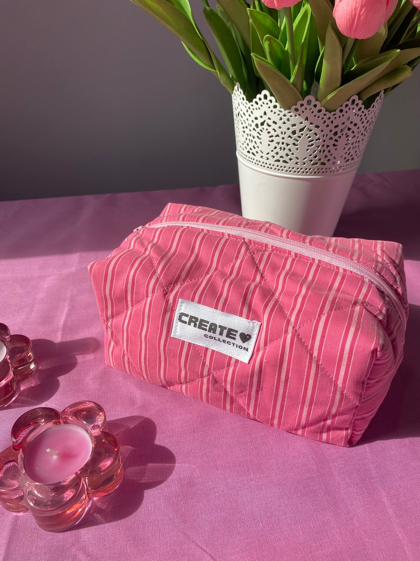 Trousse rose à rayures