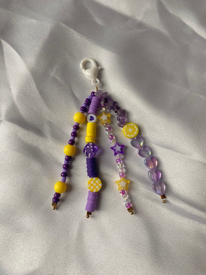 Porte-clés violet et jaune