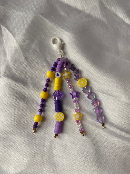 Porte-clés violet et jaune